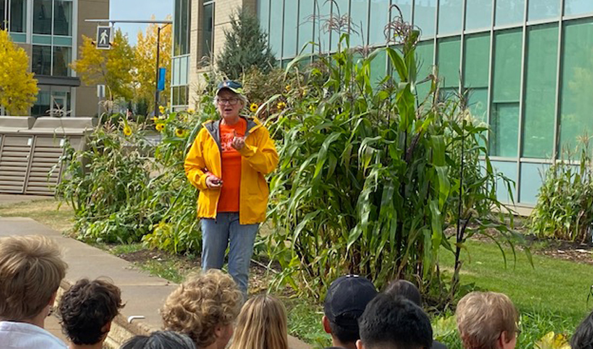 Dr. Khatija Westbrook, PhD,  associate professor, department of health and physical education, leads an Indigenous Gardens tour.