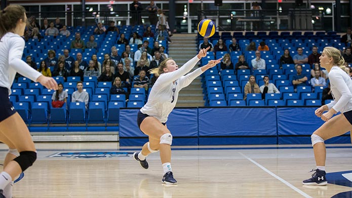 A play from a Cougars women's volleyball team