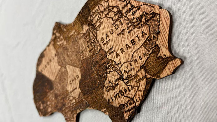 A wooden cutout of Pangaea, a supercontinent that existed during the late Paleozoic and early Mesozoic eras.