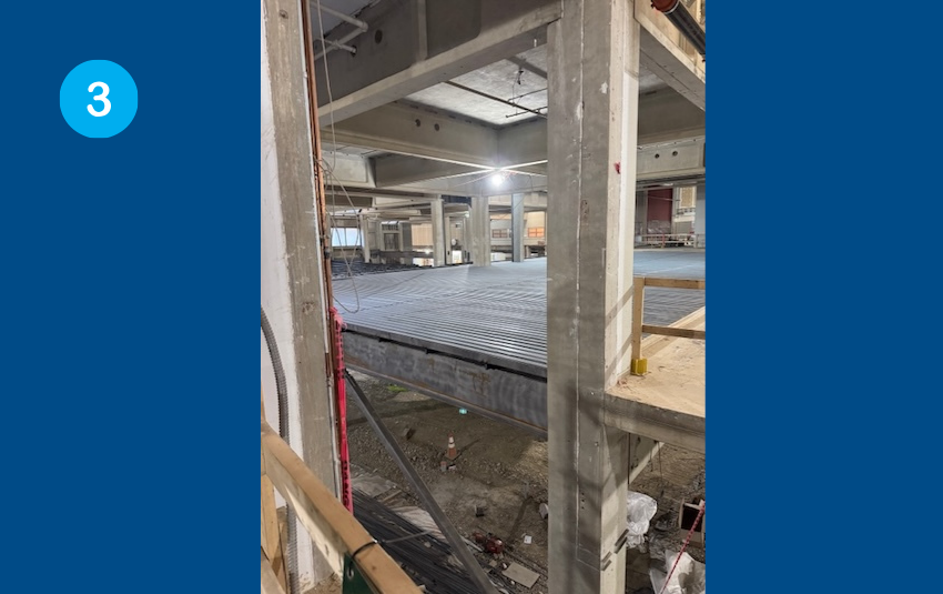 The steel decking in the new classrooms. Concrete will be poured on top of this decking to form the floors.