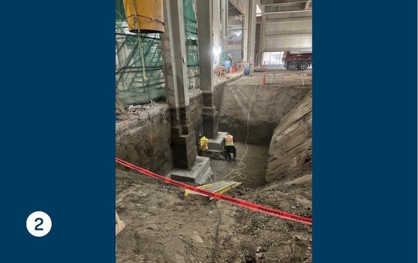 Photo 2 is a view into a pit dug around a footer of a support beam. 