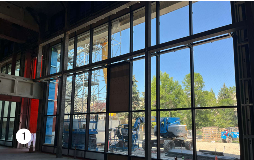 The curtain wall in Sam Plaza overlooks the T-wing courtyard. 