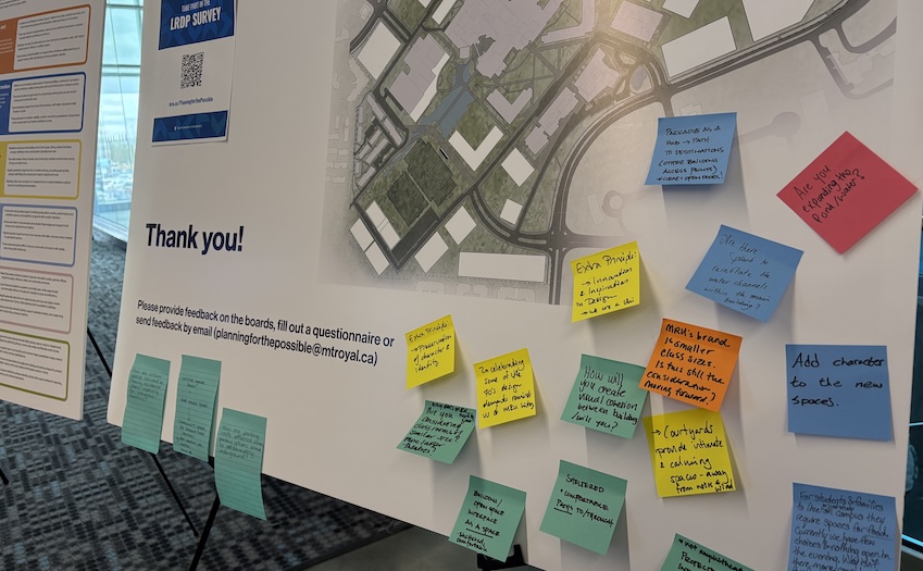 Sticky notes placed on an information board included input such as the need to consider visual cohesion and questioning if the pond was being expanded.