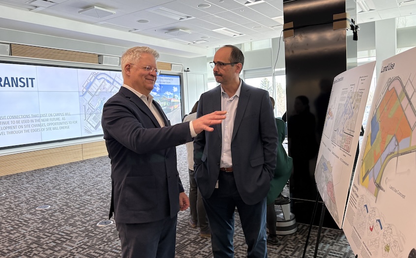 Member of Parliament for Calgary Signal Hill David McKenzie, left, chats with Mount Royal’s Boris Dragicevic, advisor, Major Capital Projects, during the Open House.