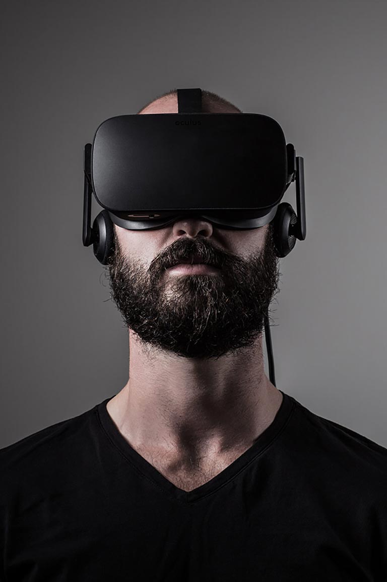 Psychology student Josh Stewart wearing VR goggles.