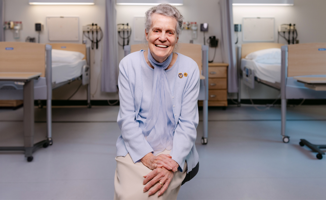 Anne Kendrew poses for a photo in the Mount Royal University nursing lab.