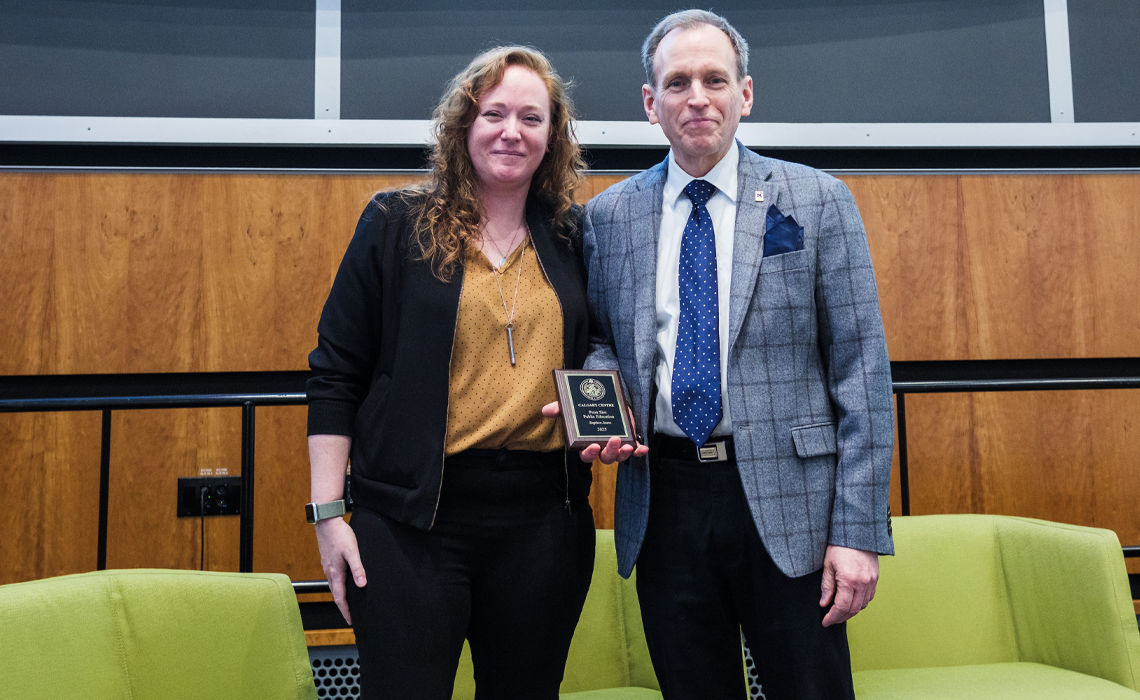 Dr. Stephen Jeans, PhD, received the 2025 RASC’s Peter Sim Public Education Award from Heather Laird, RASC president, Calgary Centre.