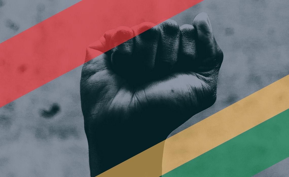 A raised fist to symbolize black history month.