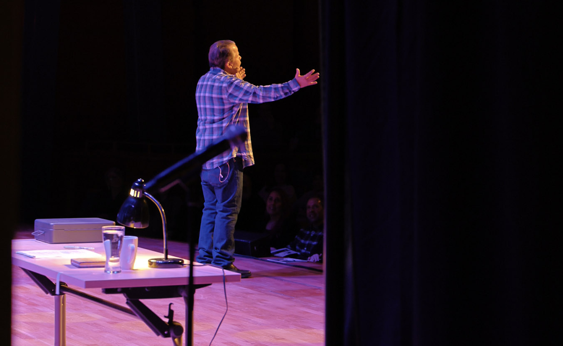 McCulloch performing his latest comedy album, Dark Purple Slice, for fans at the Bella.