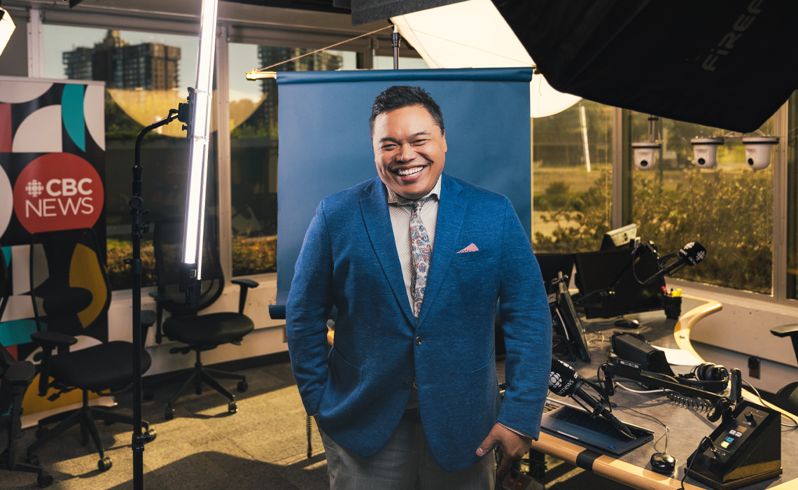 Chris dela Torre, host of Calgary's The Homestretch, poses for a photo in the studio.