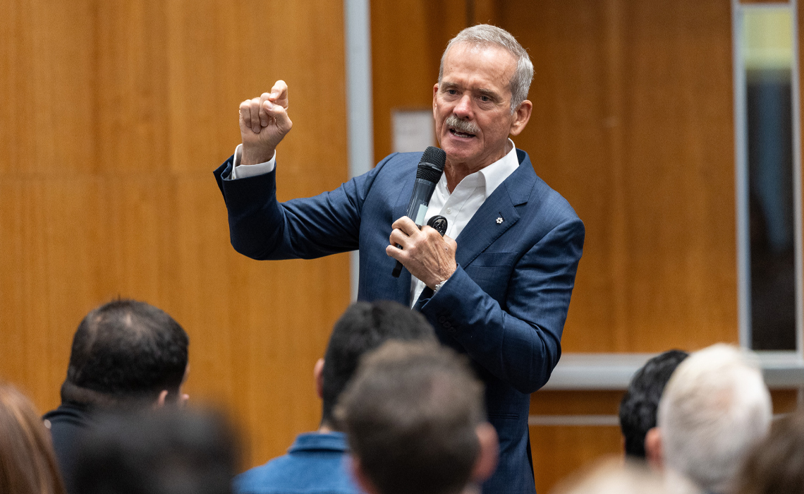 Chris Hadfield speaking to an audience of close to 400 Mount Royal students, employees, faculty and community members.