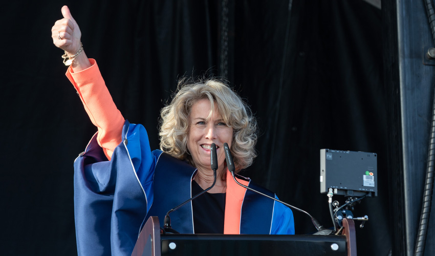 Dawn Farrell gives thumbs up to MRU graduates.