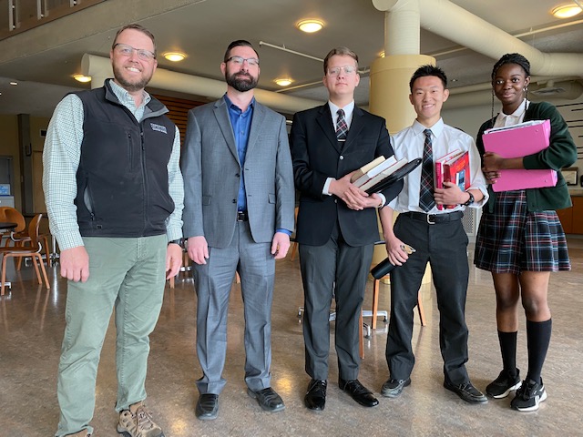 Josha Symonds, Principal Educator, FFCA; Phil Warsaba, Vice-Provost and Associate Vice-President, Students, MRU; and Grade 12 students Victor Bunescu, Dai Matsuzaka and Morire Akinbile.