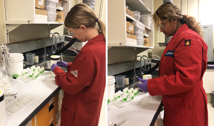 Photo of Danielle Dusome and Hannah Grewal analyzing water samples.