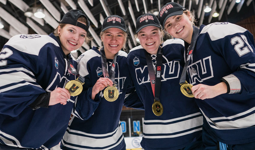 Kaitlyn Ross, Kiana McNinch, Ava Metzger and Athena Hauck celebrating their gold-medal win.