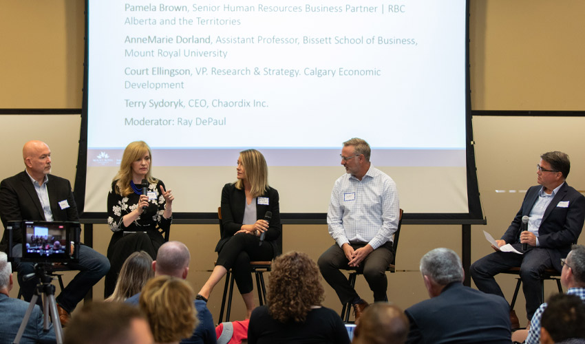 Photo of High Impact Talent Roundtable panel discussion.