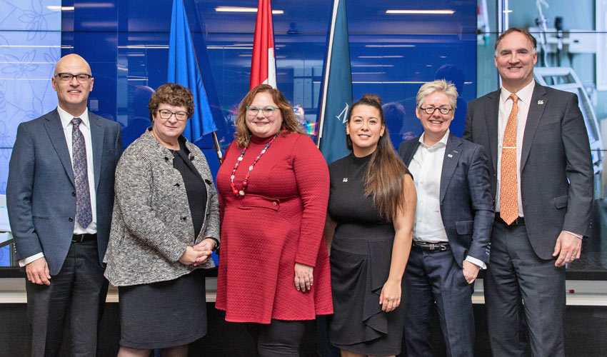 From left to right: Dr. Murray Holtby, Chair of School of Nursing and Midwifery; Dennie Hycha, President of the College and Association of Registered Nurses of Alberta; the Honourable Minister Sarah Hoffman; Nicole Taketa, fourth year nursing student, Lesley Brown, Provost and Vice-President Academic Affairs and Stephen Price, Dean of Health, Community and Education. 