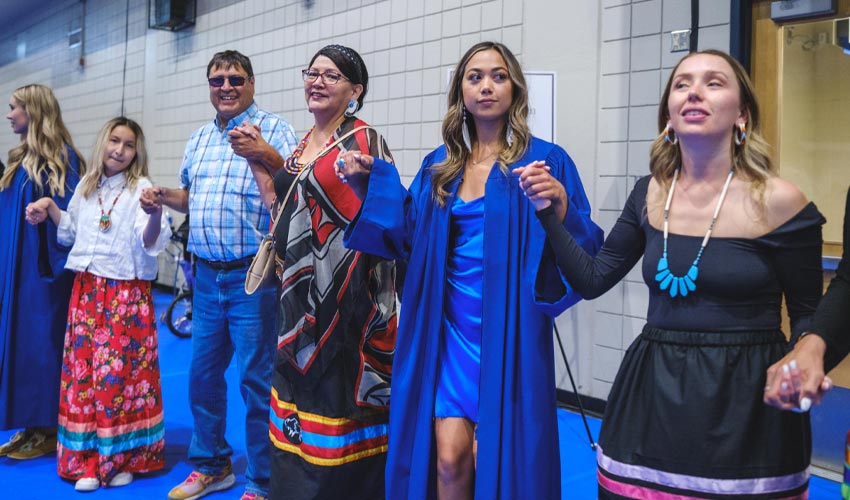 Grads, family, friends, faculty and staff took part in a round dance at the celebration.