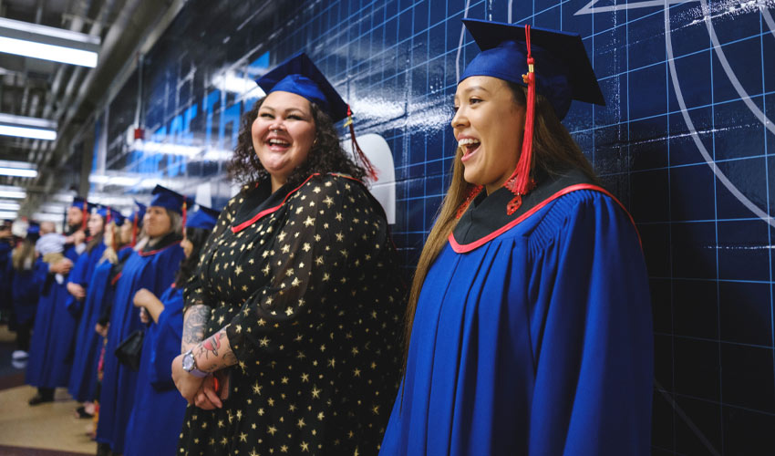 Graduates line up to take part in the Grand Entry that opened the celebration.