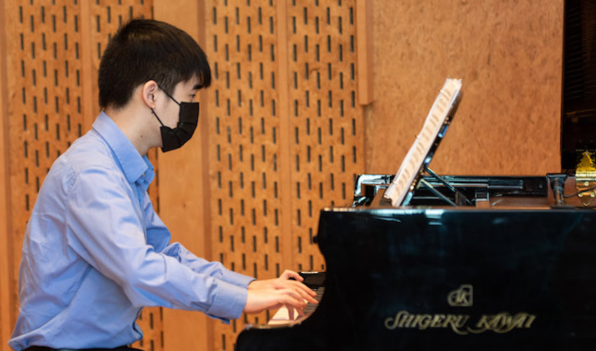 Pianist Kevin Chen, seen here playing at the Mount Royal Conservatory.