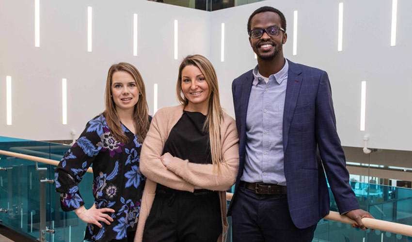 Three of the founders of Mooch in the Riddell Library and Learning Centre