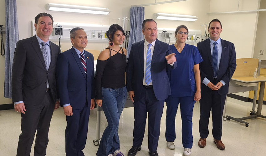 From left: Health Minister Jason Copping, Philippines Consul General Zaldy Patron; SAMRU VP External Tera Leigh Cardinal, Premier Jason Kenney, BCN Student Hana Sahyouni, and Advanced Education Minister Demetrios Nicolaides after government announcement at MRU.