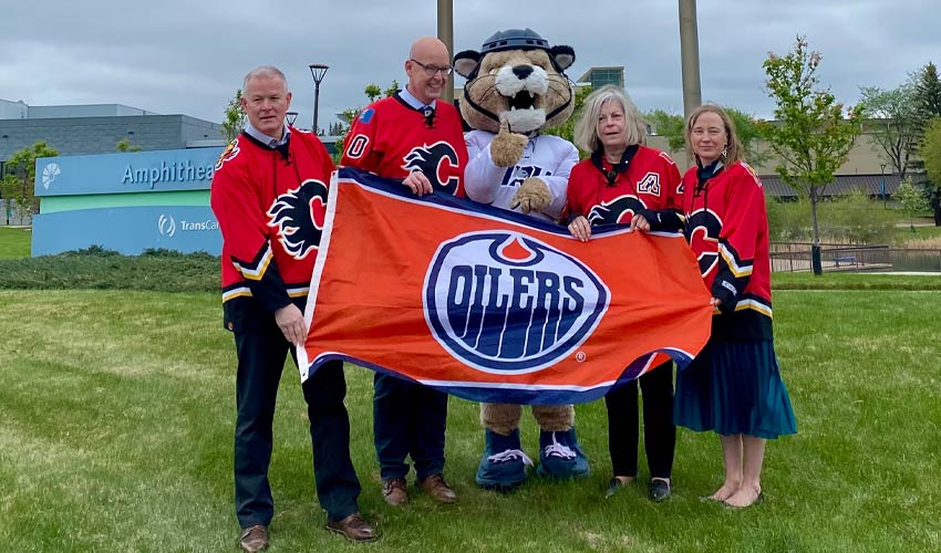 From left: Paul Rossmann, vice-president, University Advancement; Tim Rahilly, president and vice-chancellor; Calvin the Cougar; Elizabeth Evans, interim provost and vice-president, academic and Amy Nixon, general counsel and university secretary.