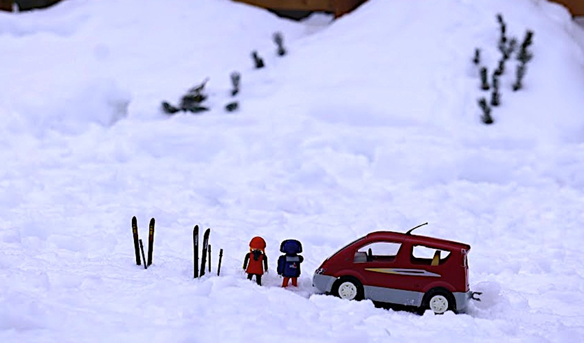 Photo of playmobil characters posed in the snow.