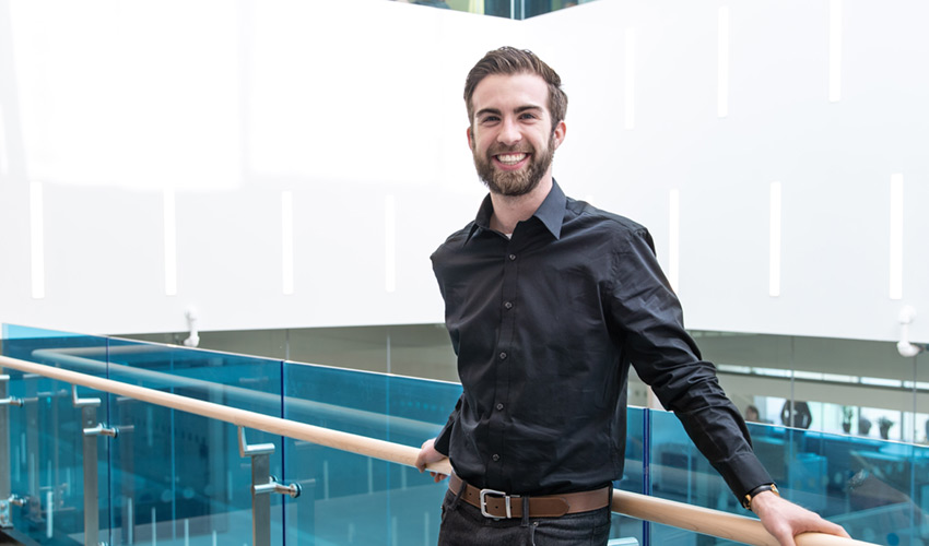 Luke Morstad, founder of Outlier Surf & Adventure Co. in the Ridell Library and Learning Centre