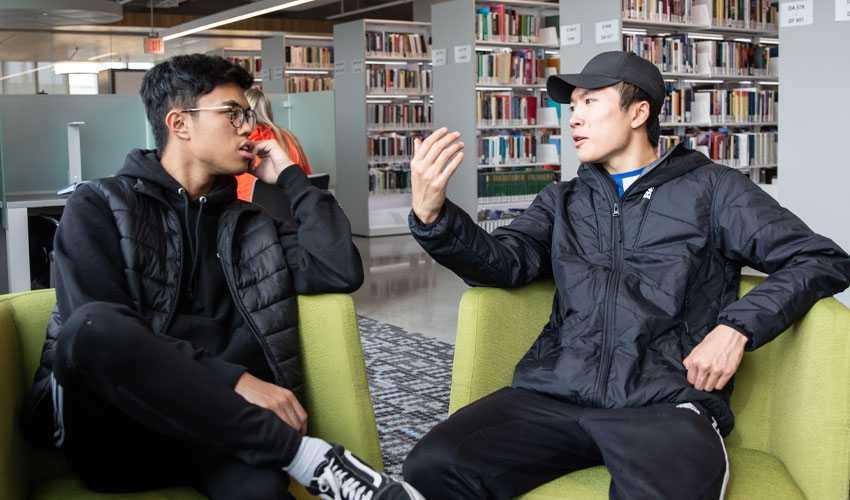 TVP students — such as Eugene Boceta, left, and Steven Liu — “love being at university. They enjoy being social, being challenged and being treated like a typical student,” says program administrator Craig Baskett. “We have high expectations academically and in the workplace, but we also provide the support for our students.”