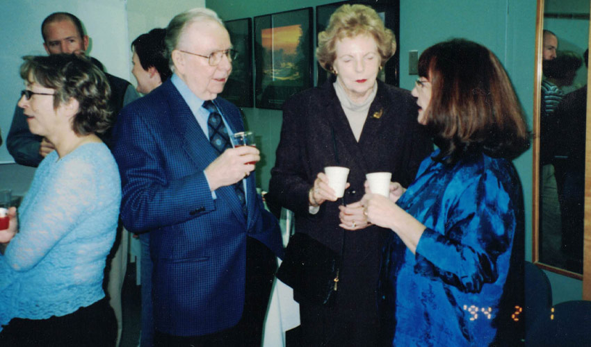 Gerry and Margaret Law chat with program administrator Valerie Parish.