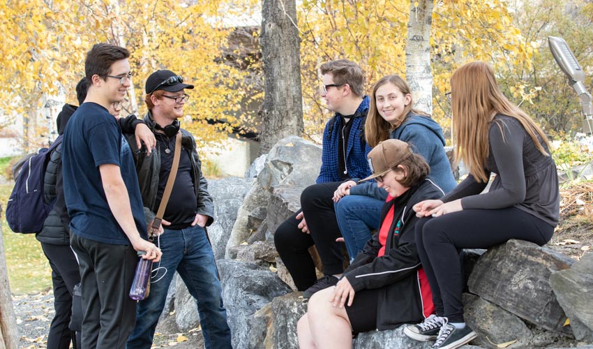 A group of MRU students hanging-out near Charlton Pond.