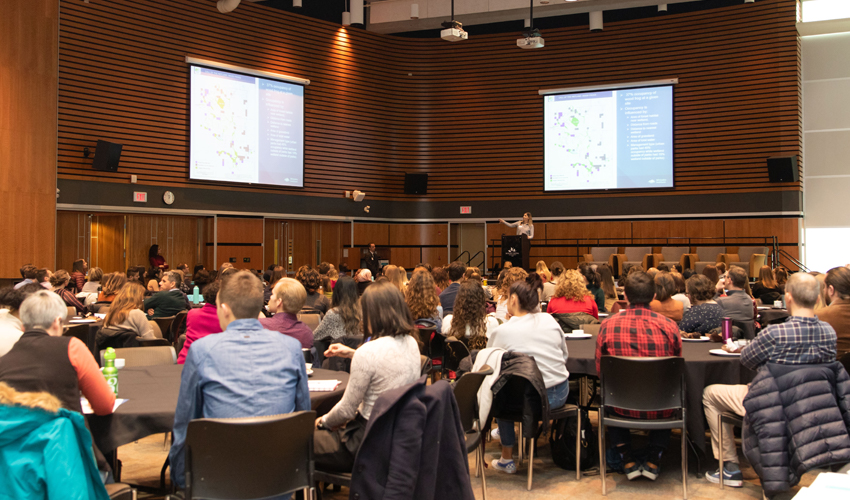 Wide shot of symposium.