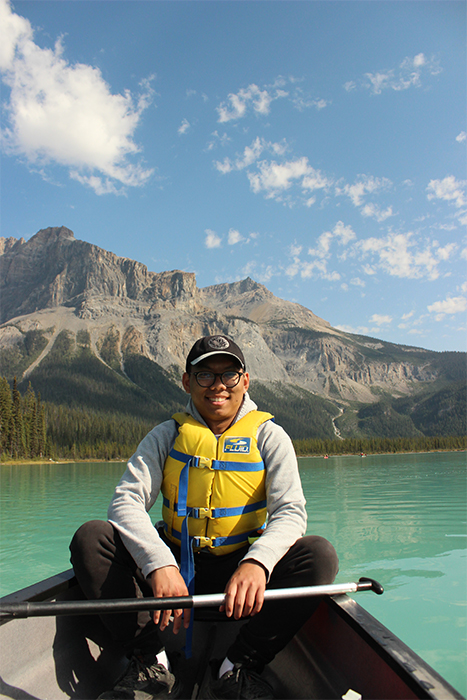Duke Vo canoeing on Emerald Lake in Yoho National Park. 
