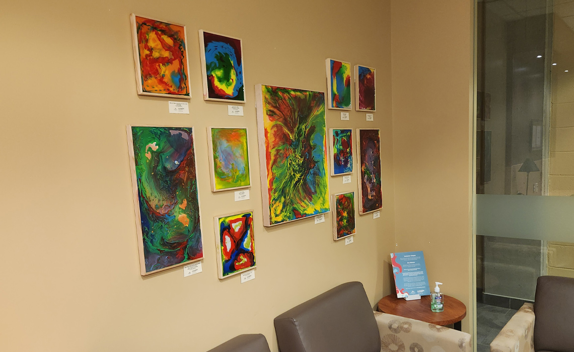 Art pieces co-created by Club 36 participants and massage therapy students displayed in EC2120.