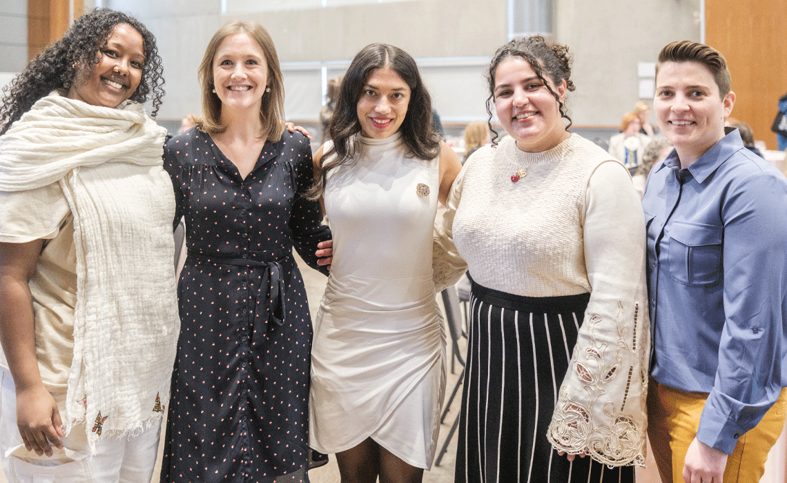Attendees smile during the International Women's Day event at Mount Royal University.