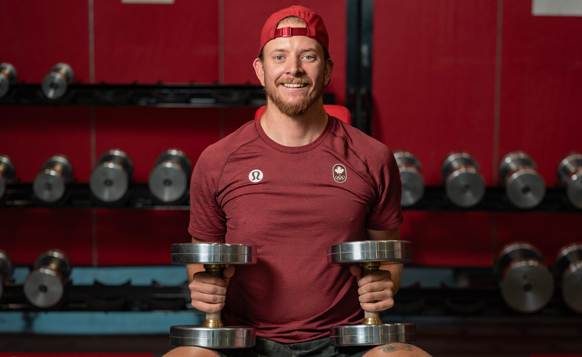 Jared Schmidt prepares for international competition in the weight room.