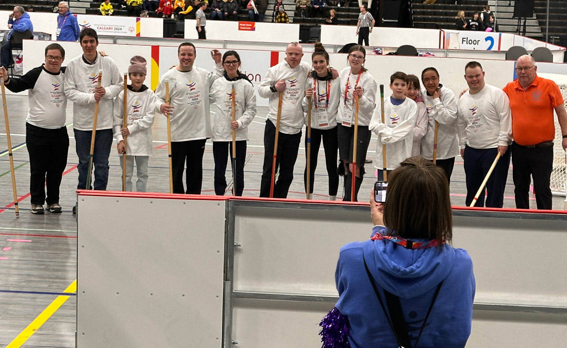 Jerome Rakochey with the official cheerleading team at the Special Olympics Canada Winter Games.