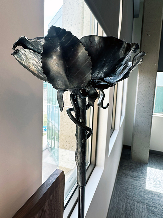 The mace features a wild rose, Alberta’s provincial floral emblem.