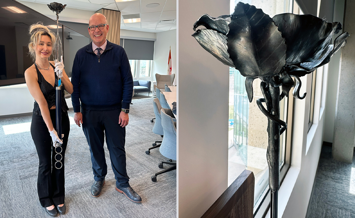 Calgary artist Sinéad Ludwig-Burgess presents the new mace to MRU president and vice-chancellor Tim Rahilly, PhD. The mace features a wild rose, Alberta’s provincial floral emblem.