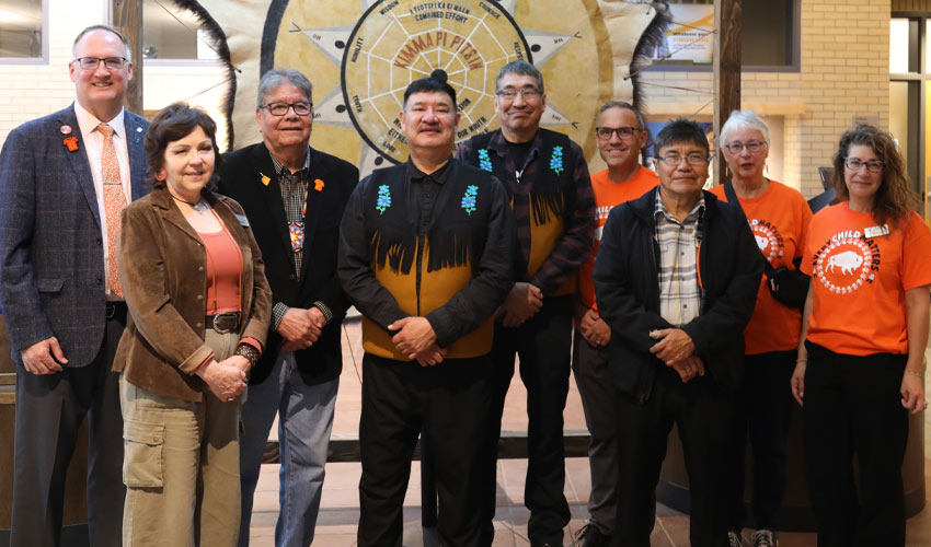 Stephen Price PhD, Dean of the Faculty of Health Community and Education; Lori Kearney, Indigenous Work Experience Coordinator, Career Services; Epsoom tah Elder Roy Bear Chief; Łutsel K'é Chief James Marlowe; Łutsel K'é Councillor Mervin Abel; Chad London, PhD, Provost and VP Acadamic; Łutsel K'é Councillor Charlie Catholique; Maggie Quance PhD, RN, Associate Dean for Research and Scholarship for the Faculty of Health, Community and Education; Julie Booke, PhD, Program Coordinator, Sport and Recreation Management.