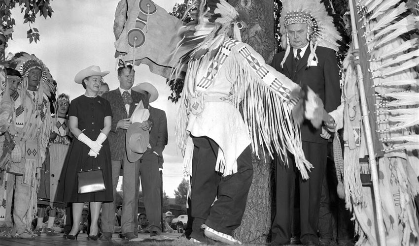 Prime Minister John Diefenbaker at Indian village, at the Calgary Exhibition and Stampede, Calgary, Alberta.