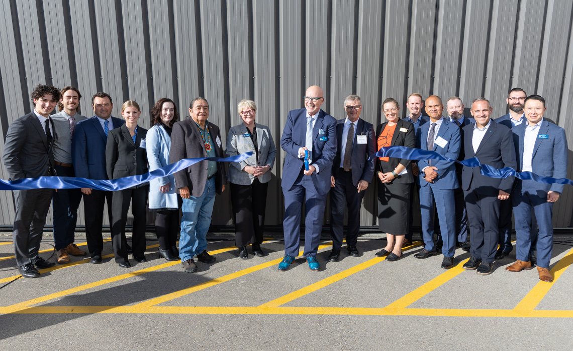 Dignitaries, students, staff and guests gather for a ribbon-cutting ceremony at MRU's new Springbank aviation campus on Friday, Oct. 4.