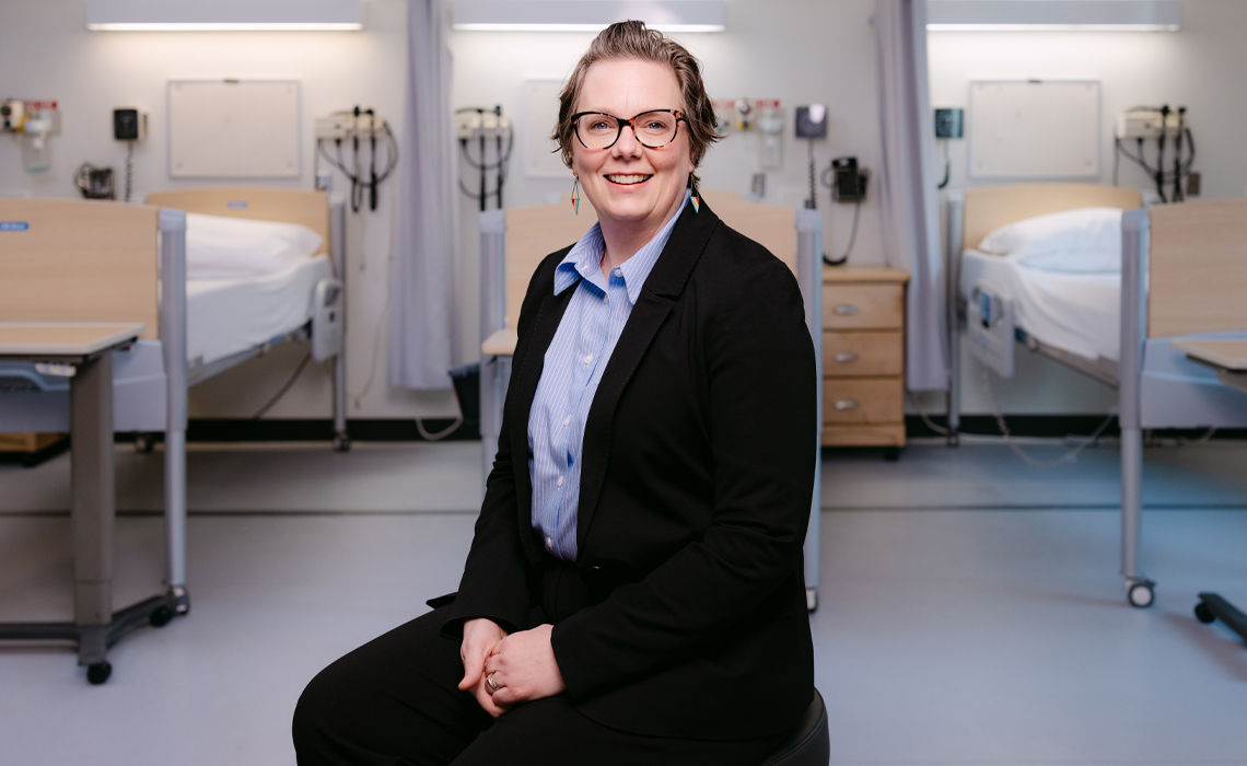 Rachael Edwards poses for a photo in the Mount Royal University nursing lab.