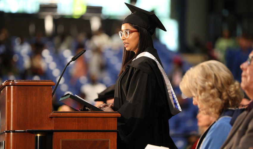 Alumna Shifrah Gadamsetti speaks to the new alumni on June 2.