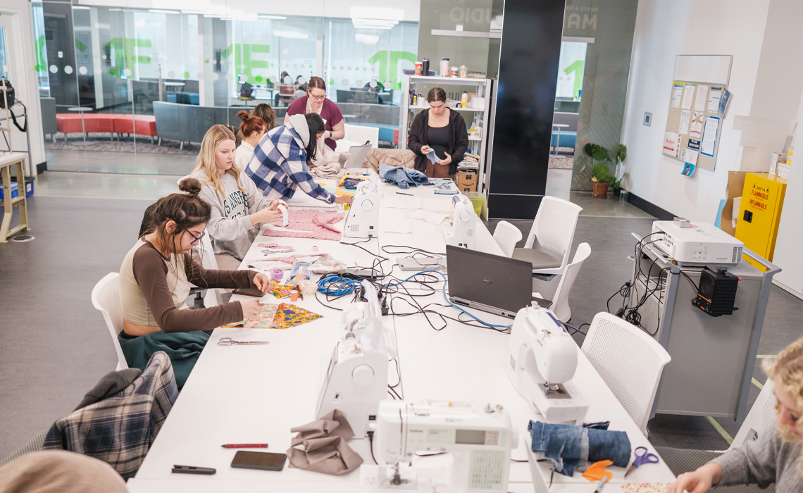 Students and staff working on the project in Mount Royal Library’s Maker & Media Commons.