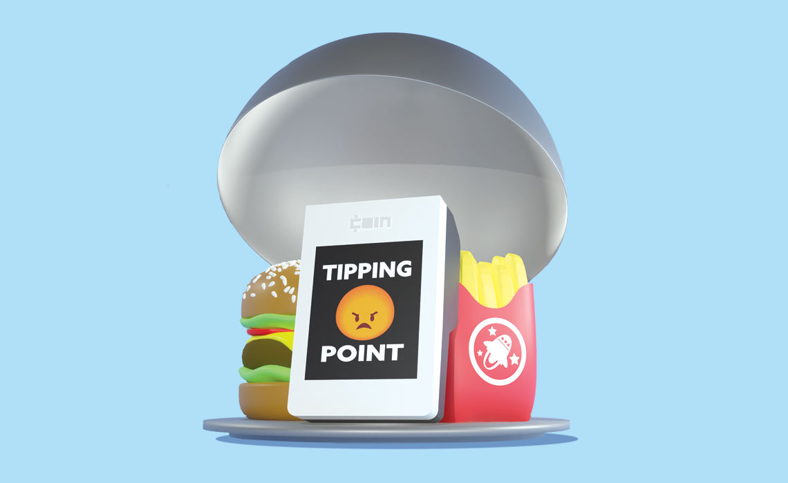 A delicious burger, crispy fries, and a payment machine labeled tipping point.