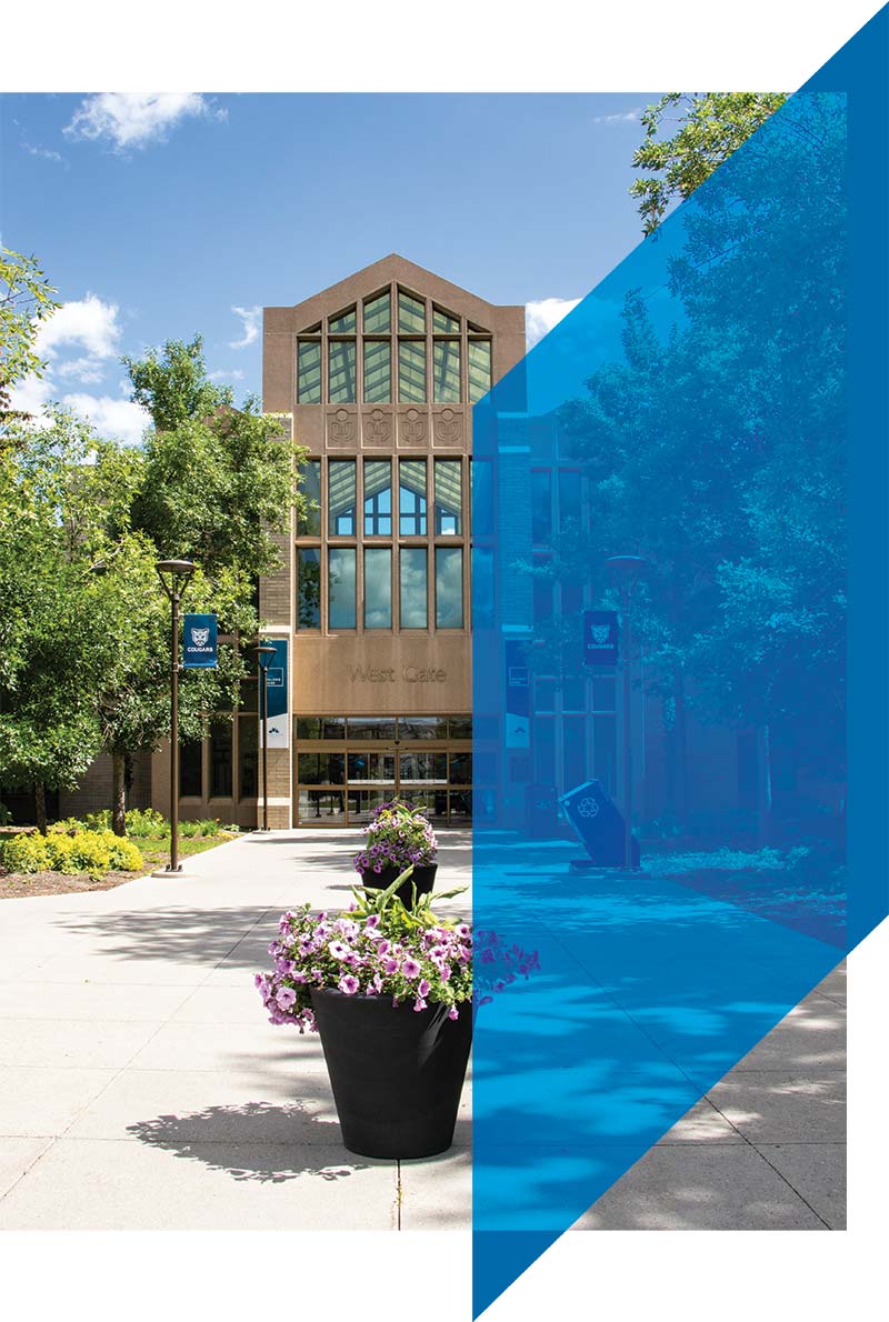Photo of the exterior of West Gate at Mount Royal University. There is half of a chevron from the Mount Royal University logo overlayed over the photo in blue.