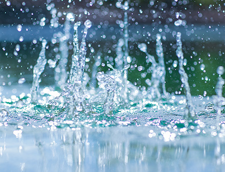 Water drops and splashing in a pond.