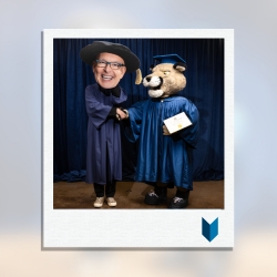 Calvin the Cougars shaking the hand of the President